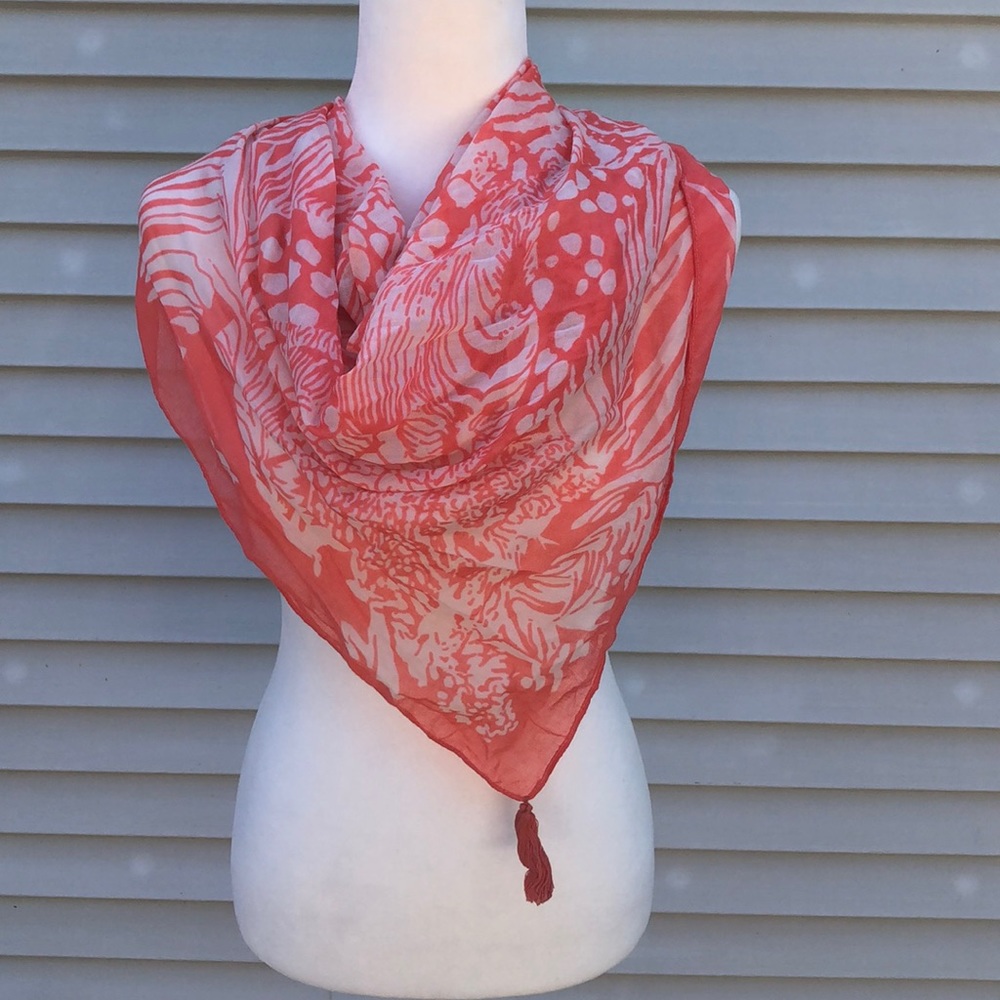 Coral and white printed scarf with tassel ends